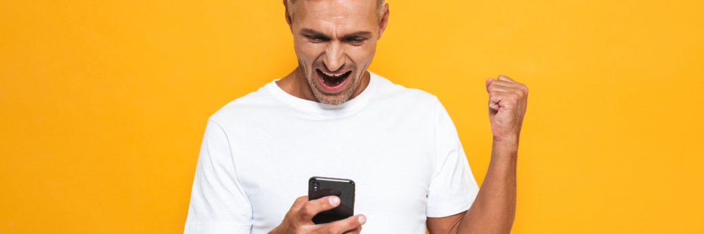 person excited interacting with mobile phone experience